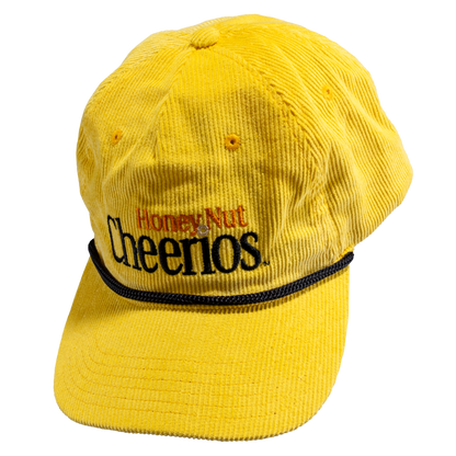 Yellow corduroy rope cap with Honey Nut Cheerios logo on the front.