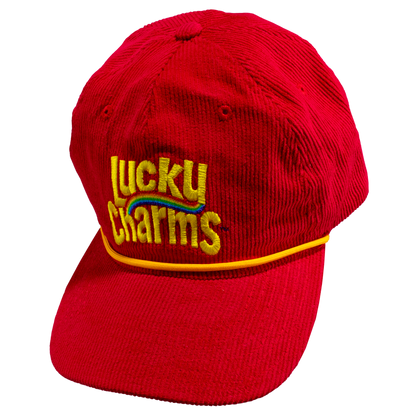 Red corduroy rope cap with Lucky Charms logo on the front.