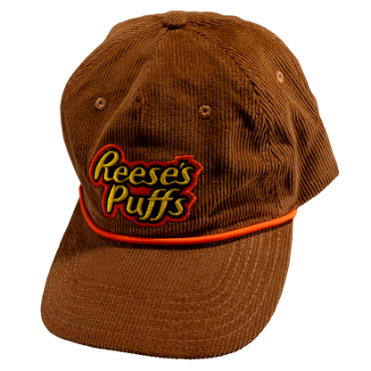 Brown corduroy rope cap with Reese's Puffs logo on the front.